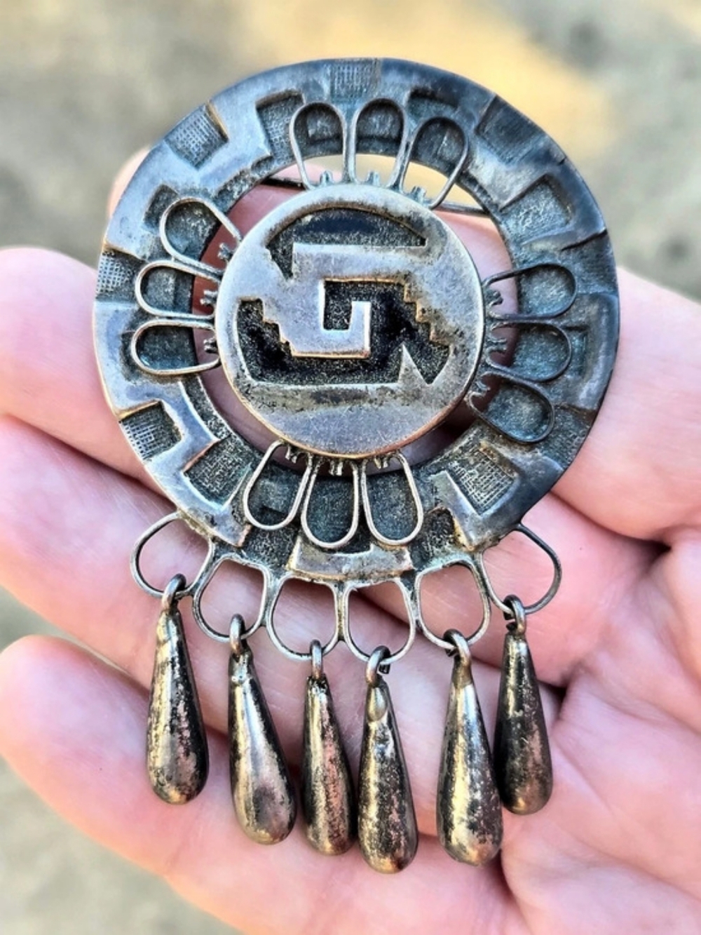 Vtg. sterling silver, Mexico, circular layered brooch with dangling pieces